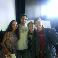 Francesca Varela standing with three fellow writers at an event in Marylhurst, Oregon.